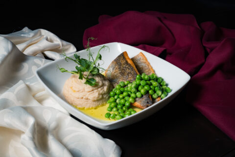 Photo of Sea bass with celeriac puree and green pea puree